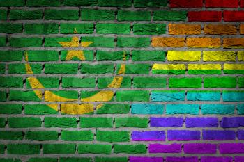 Dark brick wall texture - coutry flag and rainbow flag painted on wall - Mauritania