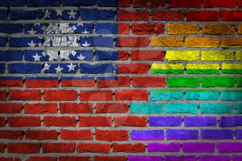 Dark brick wall texture - coutry flag and rainbow flag painted on wall - Myanmar