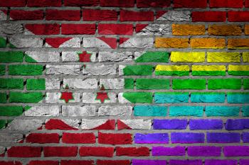 Dark brick wall texture - coutry flag and rainbow flag painted on wall - Burundi