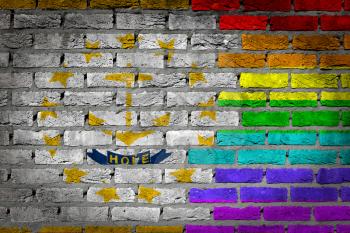 Dark brick wall texture - coutry flag and rainbow flag painted on wall - Rhode Island