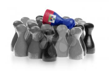 One unique pawn on top of common pawns, flag of Haiti