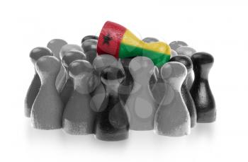 One unique pawn on top of common pawns, flag of Guinea-Bissau