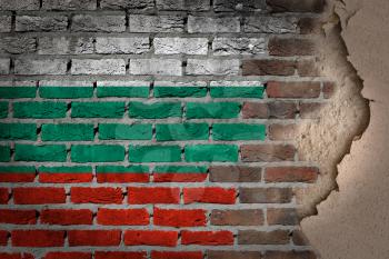 Dark brick wall texture with plaster - flag painted on wall - Bulgaria