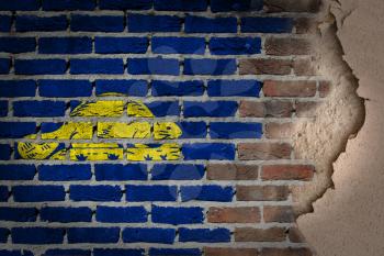 Dark brick wall texture with plaster - flag painted on wall - Oregon