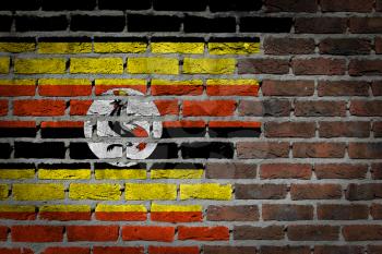 Dark brick wall texture - flag painted on wall - Uganda