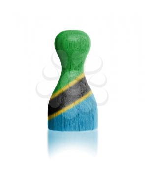 Wooden pawn with a painting of a flag, Tanzania