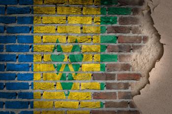 Dark brick wall texture with plaster - flag painted on wall - Saint Vincent and the Grenadines