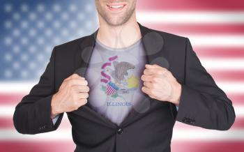 Businessman opening suit to reveal shirt with state flag (USA), Illinois