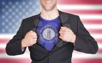 Businessman opening suit to reveal shirt with state flag (USA), Kentucky