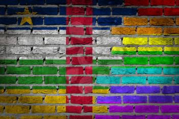 Dark brick wall texture - coutry flag and rainbow flag painted on wall - Central African Republic