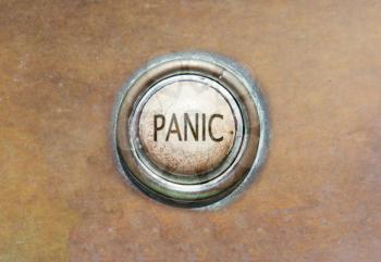 Grunge image of an old button - panic