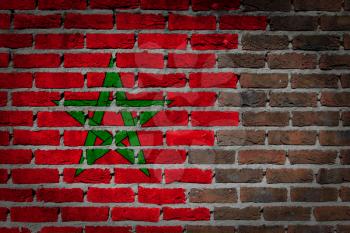 Dark brick wall texture - flag painted on wall - Morocco