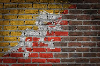 Dark brick wall texture - flag painted on wall - Bhutan