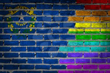Dark brick wall texture - coutry flag and rainbow flag painted on wall - Nevada