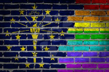 Dark brick wall texture - coutry flag and rainbow flag painted on wall - Indiana