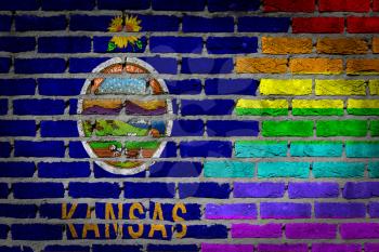 Dark brick wall texture - coutry flag and rainbow flag painted on wall - Kansas