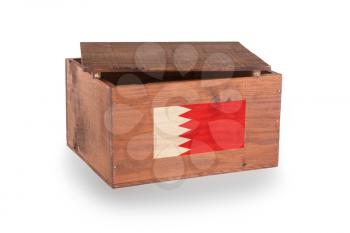 Wooden crate isolated on a white background, product of Bahrain