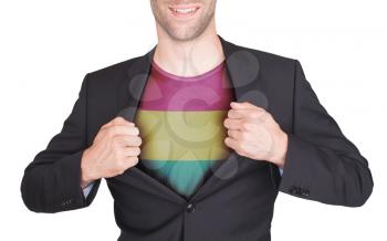 Businessman opening suit to reveal shirt with flag, Bolivia