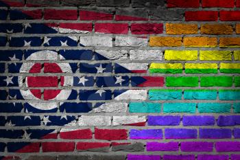 Dark brick wall texture - coutry flag and rainbow flag painted on wall - Ohio