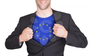 Businessman opening suit to reveal shirt with flag, European Union