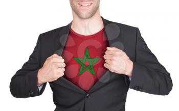 Businessman opening suit to reveal shirt with flag, Morocco