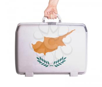 Used plastic suitcase with stains and scratches, printed with flag, Cyprus
