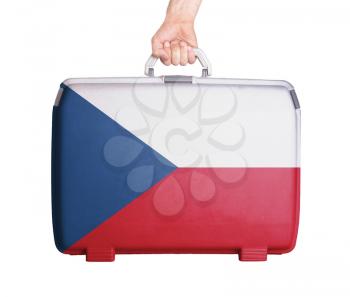 Used plastic suitcase with stains and scratches, printed with flag, Czech Republic