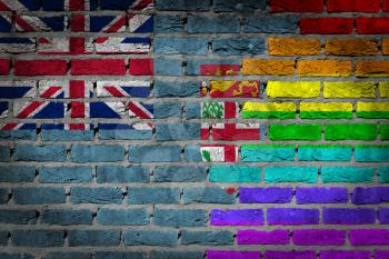 Dark brick wall texture - coutry flag and rainbow flag painted on wall - Fiji