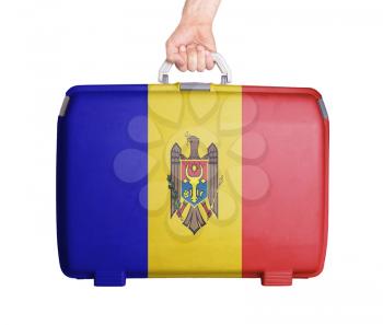 Used plastic suitcase with stains and scratches, printed with flag, Moldova