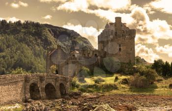 Calm sky over ruins of a small castle, old vintage look