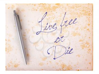 Old paper grunge background, white and brown - Live free or die