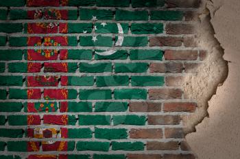 Dark brick wall texture with plaster - flag painted on wall - Turkmenistan