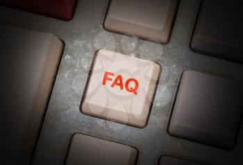 White button on a dirty old panel, selective focus - FAQ