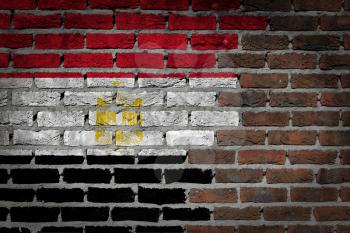 Very old dark red brick wall texture with flag - Egypt