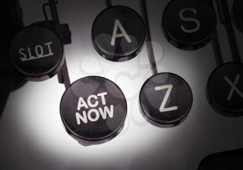 Typewriter with special buttons, act now