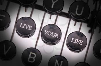 Typewriter with special buttons, live your life