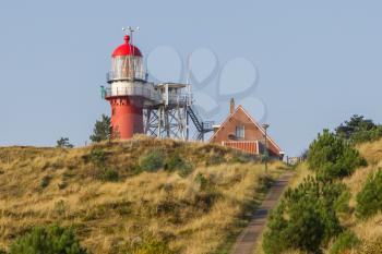 Red lighthouse at the dutch isle of Vlieland