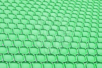 Green seat in sport stadium, empty seats ready for the public