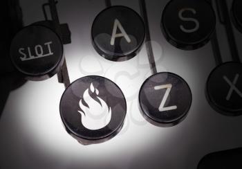 Typewriter with special buttons, fire