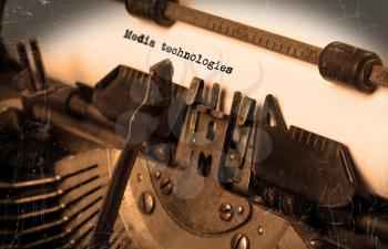 Close-up of an old typewriter with paper, selective focus, Media technologies