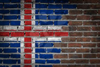 Very old dark red brick wall texture with flag - Iceland