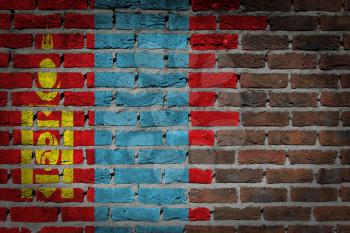 Very old dark red brick wall texture with flag - Mongolia