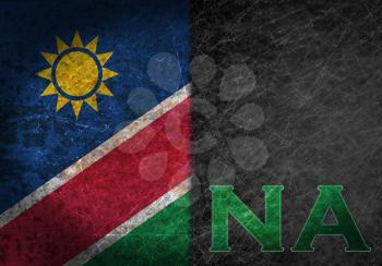 Old rusty metal sign with a flag and country abbreviation - Namibia