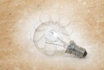 Old lightbulb isolated on a white background - Vintage look