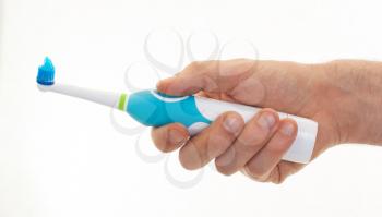 Electric toothbrush isolated on a white background