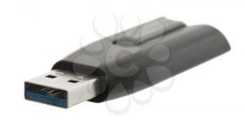 Black USB memory stick isolated on white background - Selective focus