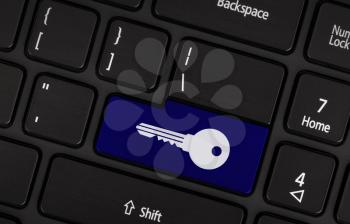 Internet security key with lock icon on laptop keyboard