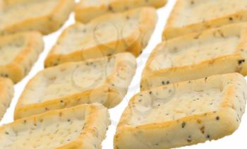 Simple square crackers isolated on a white background, selective focus