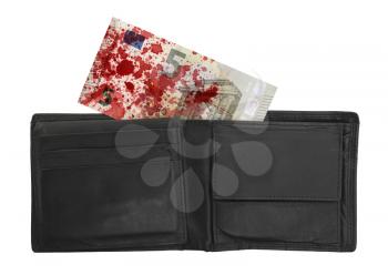 Close-up of a 5 euro bank note, isolated, stained with blood
