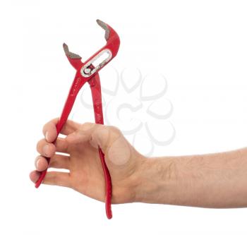 Hand of male plumber with a red wrench, isolated